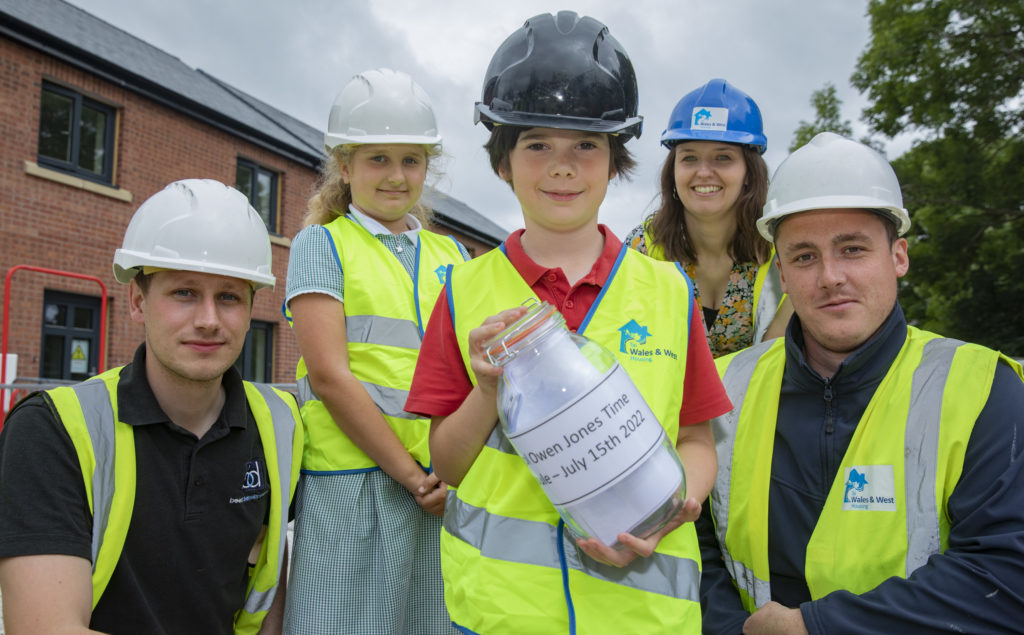 Pupils from Ysgol Owen Jones with the time capsule