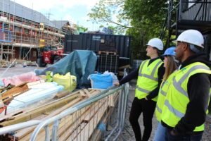 Development trainees wearing PPE at construction site in North Wales