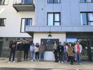 Grow Our Own Trainees standing outside WWH extra care scheme Plas Yr Ywen in Holywell