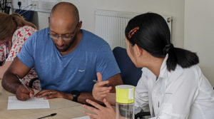 Grow Our Own trainees completing a training session in WWH's West Wales office