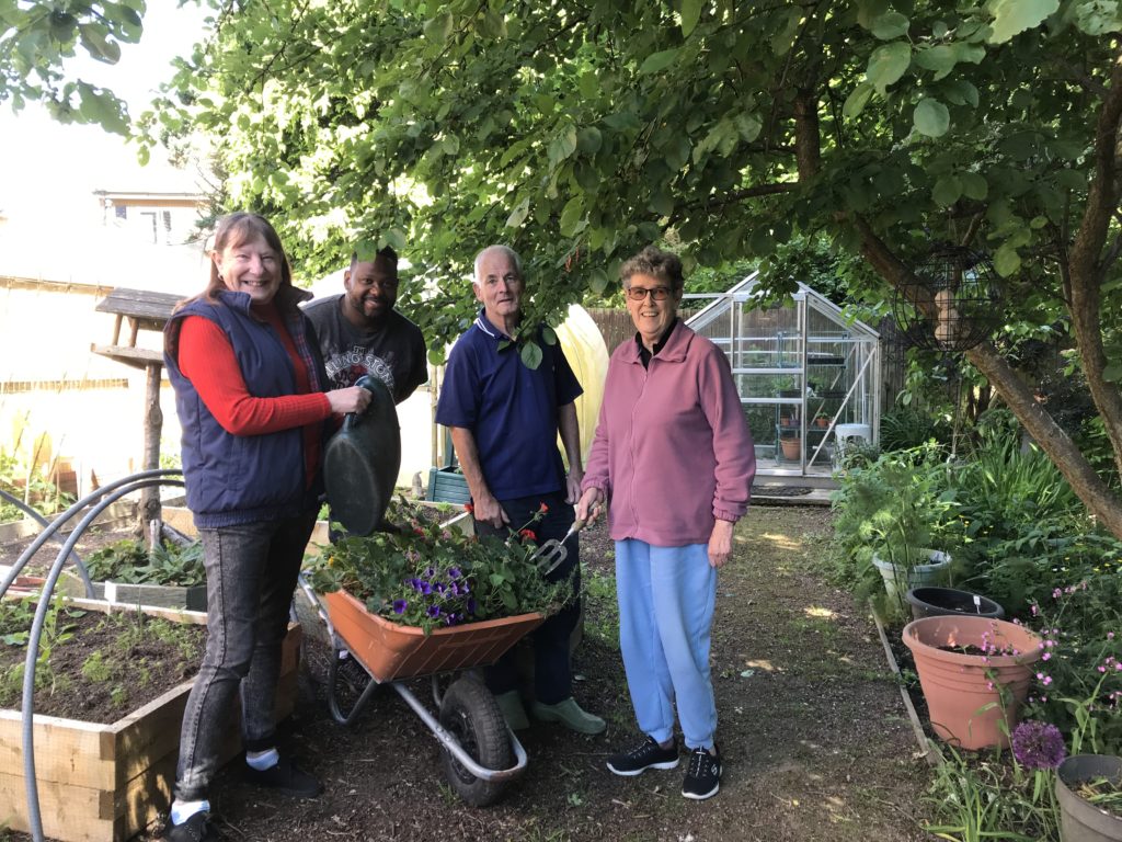 WWH help residents to maintain community garden
