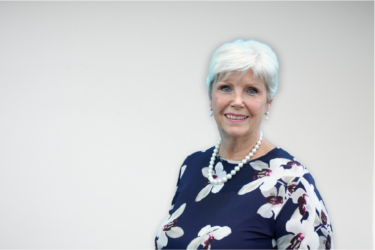 Board member Kathy Smart smiling to camera