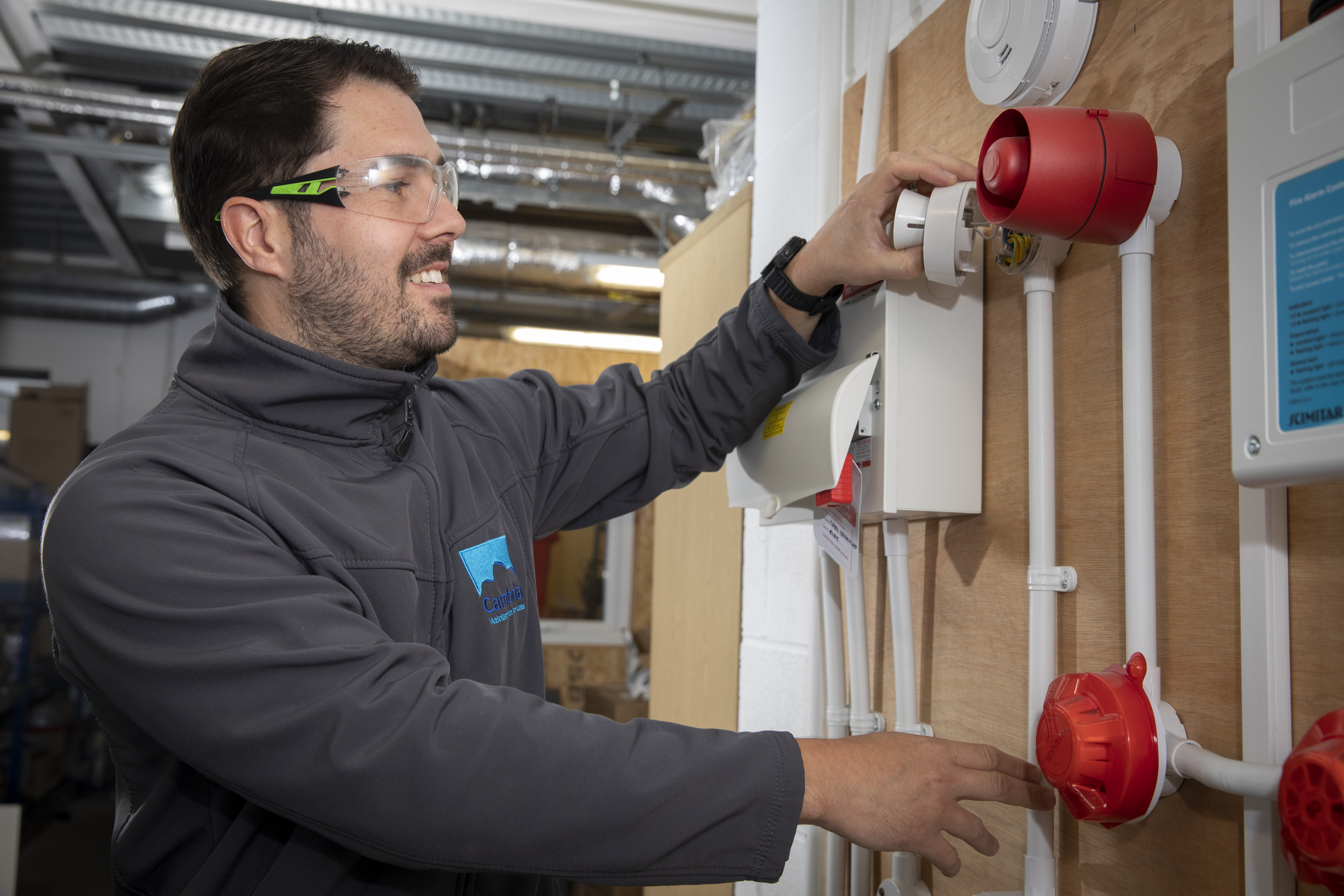 Cambria Maintenance Services Electrician completing a repair