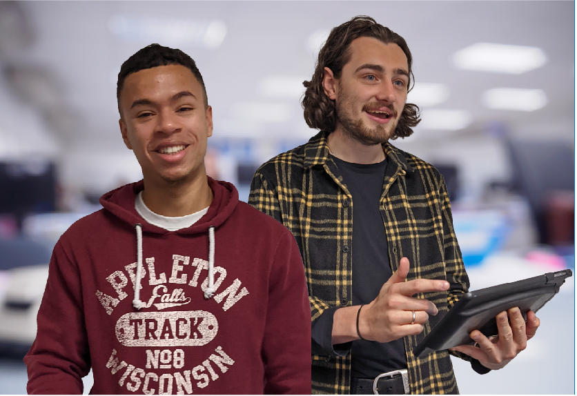 Two young members of WWH staff smiling, one using a tablet