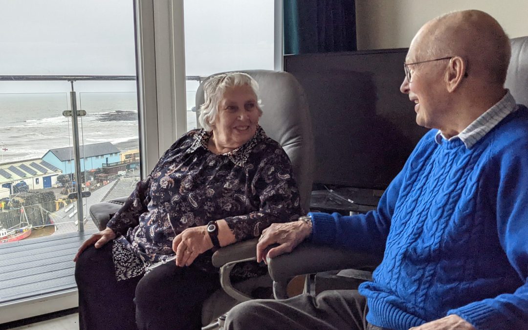WWH residents enjoying view over harbour from their WWH home