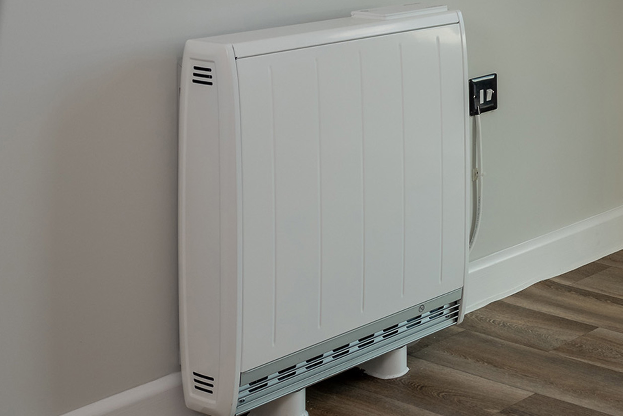 Image of an Air Source Heat Pump machine on the ext