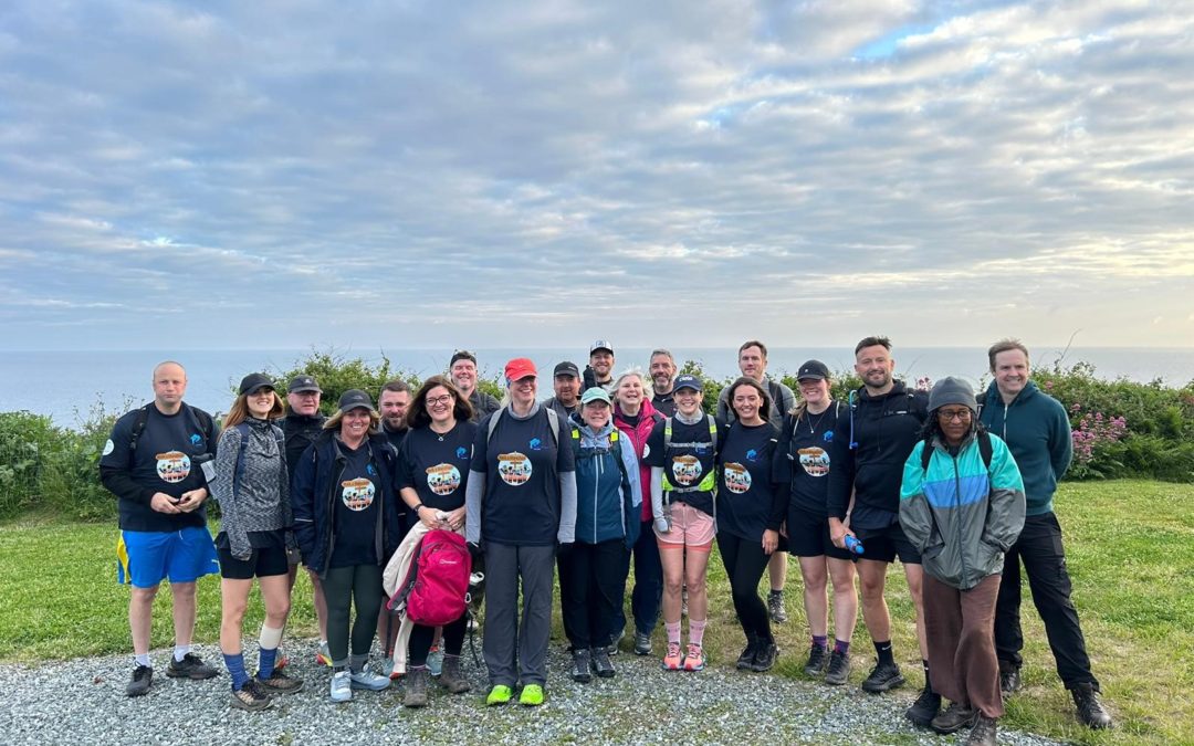 Housing development team’s marathon walk raises more than £10,000 for charity