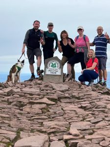 Team photo at the peak